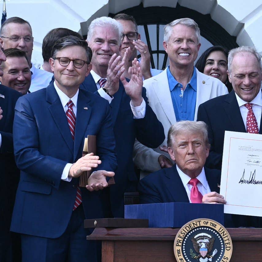 US President Donald Trump shows his signature on the "Big Beautiful Bill Act" at the White House in Washington, DC, on July 4, 2025.